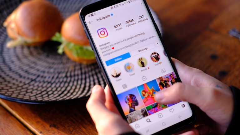 how to stop instagram saving posts to camera roll